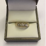 A Victorian 18ct gold ring set with 5 diamonds in an antique setting. Size N, total weight approx