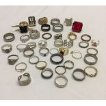 A large collection of costume jewellery rings to include 925 silver.