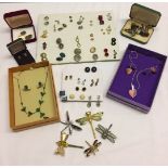 A small collection of costume jewellery to include earrings and cufflinks.