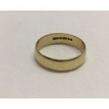 A 9ct gold wedding band size T. 3.2g.