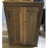 An oak corner cupboard with 3 internal shelves and key. Approx 122cm high.