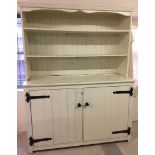 A large vintage pine dresser painted white. 168 cm wide x 124 cm tall.