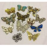 A box of 12 costume jewellery butterfly brooches.