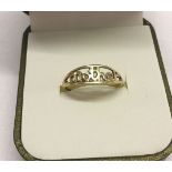 A 9ct gold 'Mother' ring size P, 1.1g total weight.