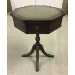 A modern reproduction octagonal wine table.