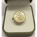 A 9ct gold St George medal ring. Size M1/2, total weight 3g.