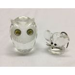 A Swarovski crystal owl 6.5cm tall together with a Swarovski mouse.