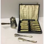 A boxed set of plated fish knives and forks together with 2 silver handled shoe horns and plated