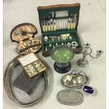 A quantity of silver plate items to include trays and boxed cutlery sets.