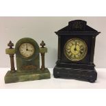 2 small mantle clocks. A black wooden cased clock with gilt decoration and a green marble cased