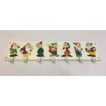 Cast iron Snow White & 7 Dwarves coat rack.