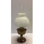 A brass oil lamp.