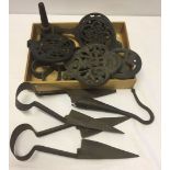 A box of wrought iron items to include sheep shears.