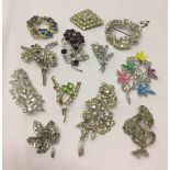A small quantity of costume brooches to include stone set and marcasite.