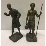 2 spelter figures of Arabs signed Debuz approx 30cm tall.