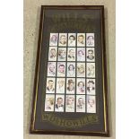 A framed & glazed reproduction set of Wills cigarette cards depicting actors and actresses. 31 x