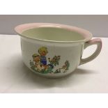 A small Shelley chamber pot decorated with Mabel Lucie Attwell design of children & pixies playing.