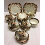 A Royal Vale china c1930s tea set comprising 12 tea cups & saucers, 12 side plates, 2 sandwich