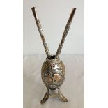 An ornate silver Yerba Mate with yellow gold gilding 12cm tall together with 2 Bombilla straws