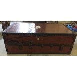 A large vintage travel trunk with metal banding. Approx 122 x 56cm.