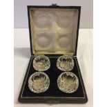 A boxed set of 4 crystal salts.