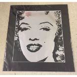 A mounted silver and black Pop Art image of Marilyn Monroe. Approx 38 x 43.5cm