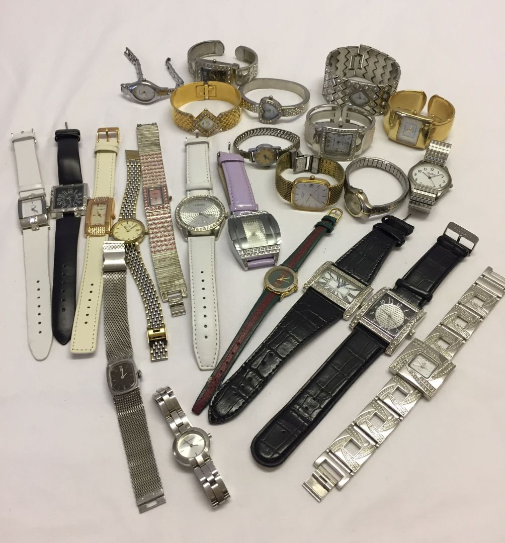 A large collectiton of ladies and gents wristwatches to include Rotary and Emporio Armani.