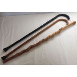 3 vintage wooden walking sticks.