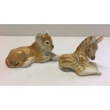 2 Lomonosov/USSR pottery figurines. A lion cub and a zebra.