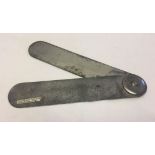 A late 19th century/early 20th century salesmans tool for card thickness by Cain, Son and Greenwood,