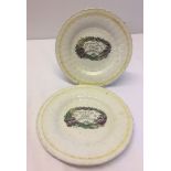 A pair of Victorian daisy plates with yellow rims and motto decoration.