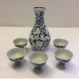 5 blue & white stem cups together with a blue and white vase - all mid 20th century. Vase 18cm