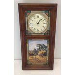 A wall hanging 'The days on the farm stained glass clock' by Danbury Mint with 4 changeable glass