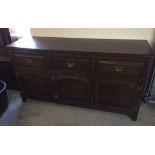 A large oak 3 drawer sideboard size 154 x 47 x 81cm high.