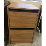 A modern beech coloured 2 drawer filing cabinet. Approx 48cm x 65cm x 78cm.