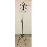A wrought iron handmade contemporary coat stand.