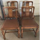 A set of 4 vintage dining chairs with leatherette seats.