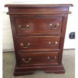 A modern solid wood 3 drawer chest with partitions for CDs approx 58 x 77cm.