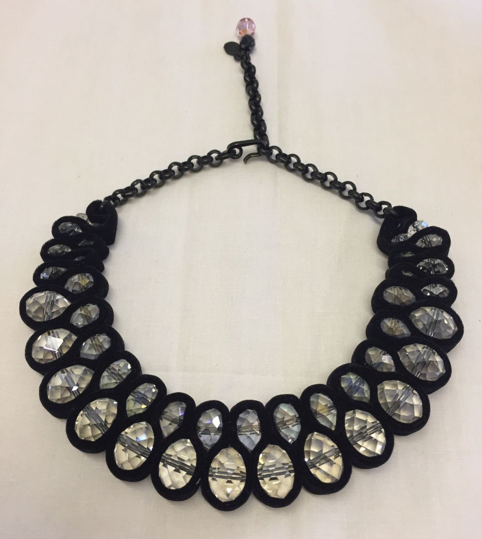 A dramatic crystal & velvet collar style necklace.