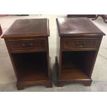 A pair of mahogany coloured bedside cabinets with drawer approx 36 x 60cm.