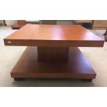 A large square beech wood coffee table. Approx 70 x 38cm.