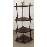 A modern dark wood 4 tier wotnot stand. Approx 102cm high.