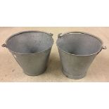 2 x galvanised metal buckets.