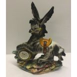 An Italian ceramic clock in the shape of a donkey 36cm high approx.