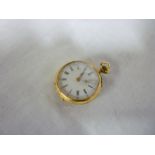 A ladies 18ct gold fob watch with circul