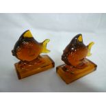 A pair of Art Deco amber tinted glass bo