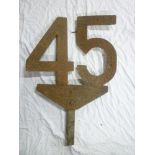 An old railway trackside iron sign "45"