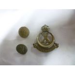 An Officers silvered cap badge of the 10