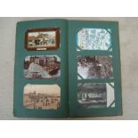 An Edwardian postcard album, topographical etc, approx 190 cards.