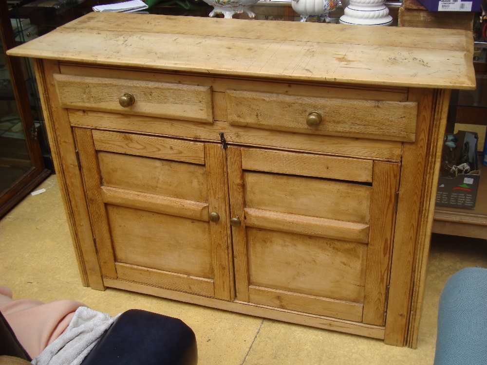 A 19th Century rustic fruitwood, pine and oak cupboard,